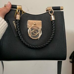 Black, white and gold purse